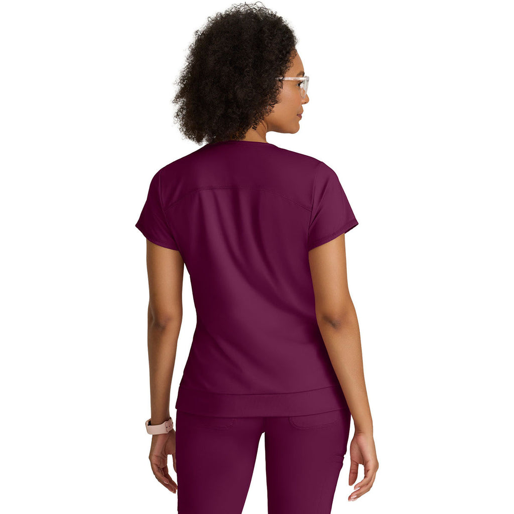 Grey's Anatomy Women's Wine Two Pocket V-Neck Motivate Top